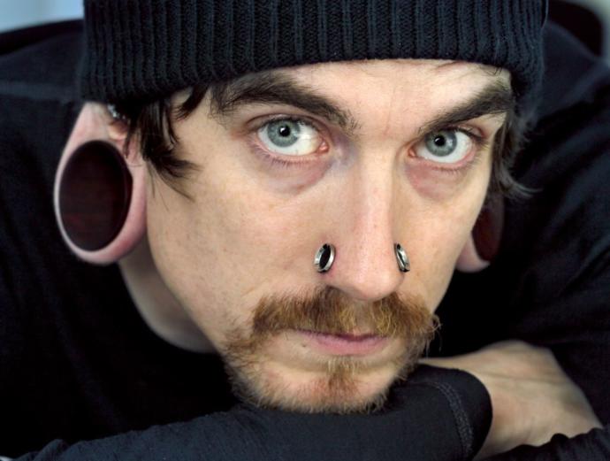 10 Crazy Body Modifications