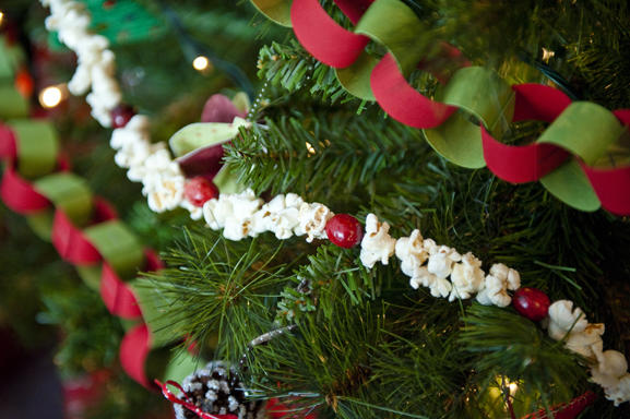 How To Make Your Crappy Artificial Christmas Tree Look Amazing (On a Budget)