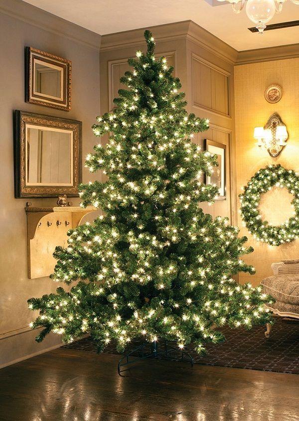 How To Make Your Crappy Artificial Christmas Tree Look Amazing (On a Budget)