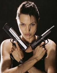 Angelina Jolie’s Lara Croft with her two HK USPs