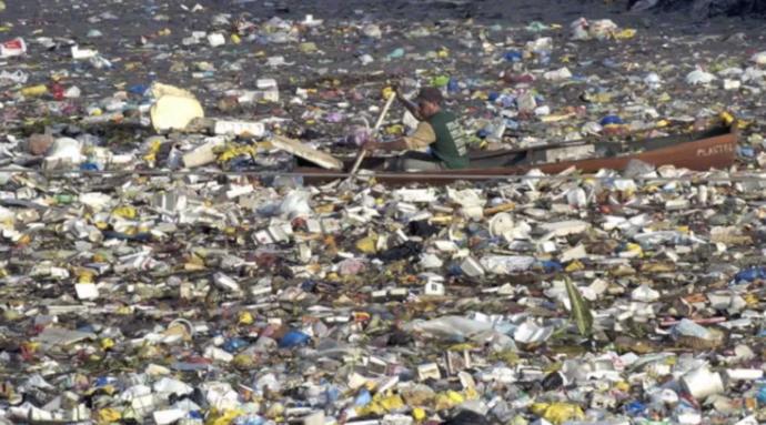 Is it not sick to see a man canoeing out in a lake full of garbage? Think about how clean our lakes are in North America before taking for granted how good we have it. 