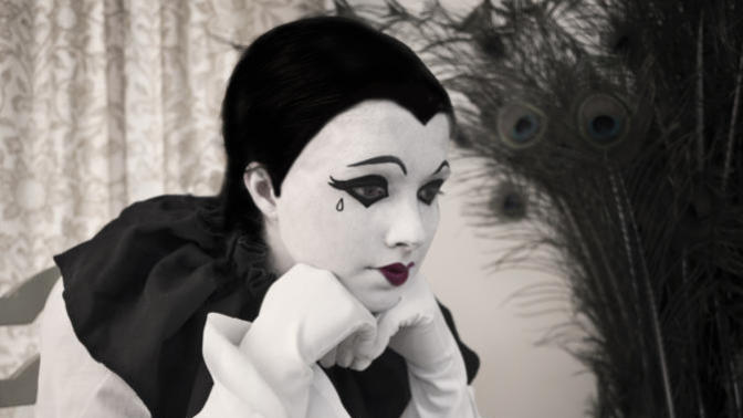 Behind the clown's make up