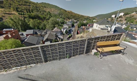 A photo of the village overlooking the trainracks.