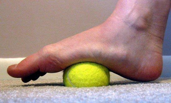 Use a tennis ball to relieve knots in feet, hips and back.