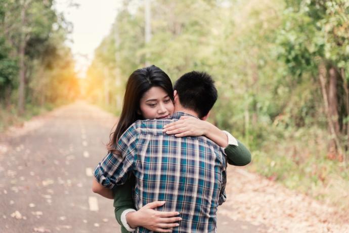 This is a friendly hug, but she may have feelings for him too