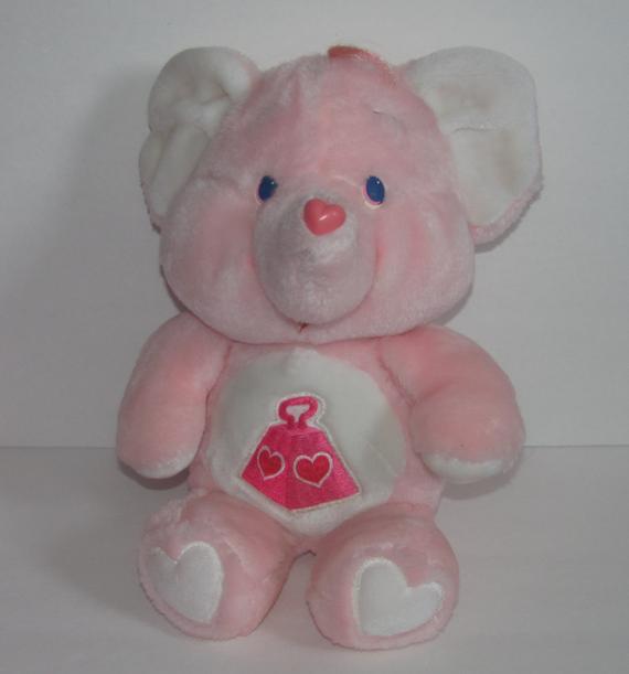 I had this Care Bear Elephant. (actually, I still have it in a bag in the attic).