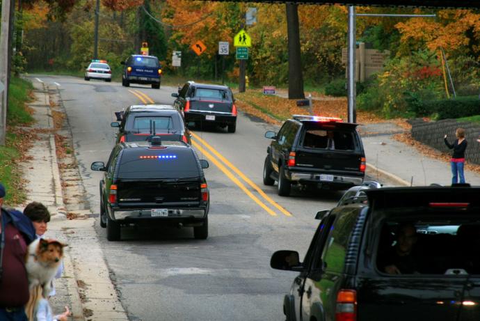 Presidential motorcade with cell jamming abilities.