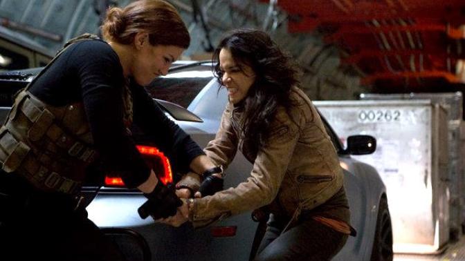 Movie and tv show fight scenes where a smaller woman takes on a larger woman