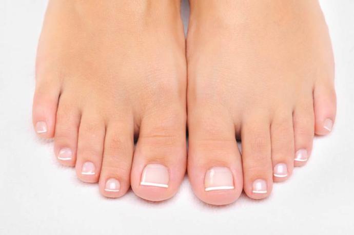 Classic square shape toenails.