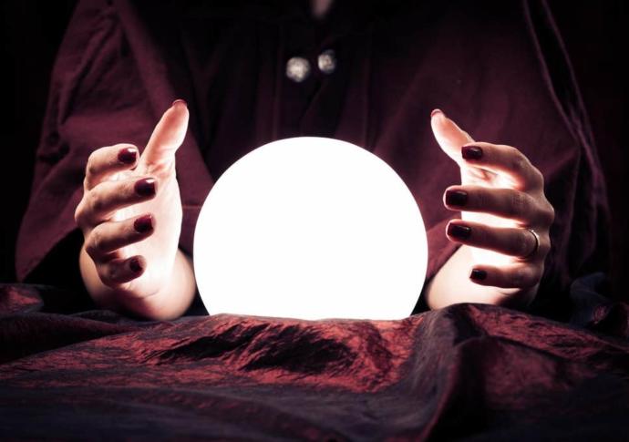 Psychic using a crystal ball