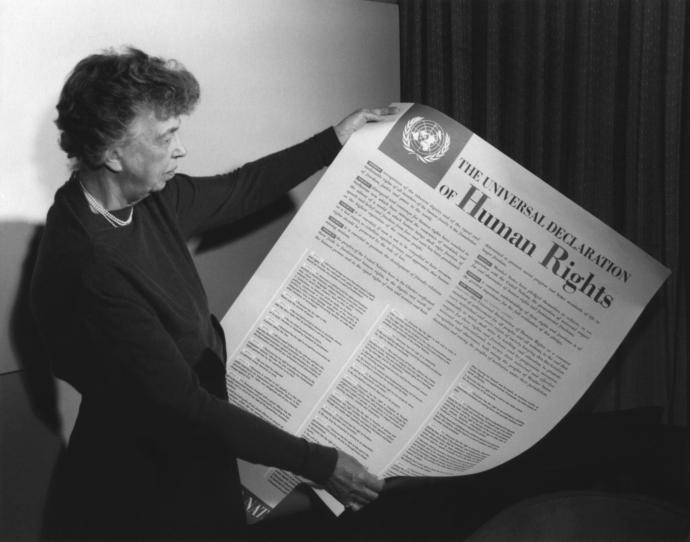 Eleanor Roosevelt with the English language copy of the UN's Universal Declaration of Human Rights.