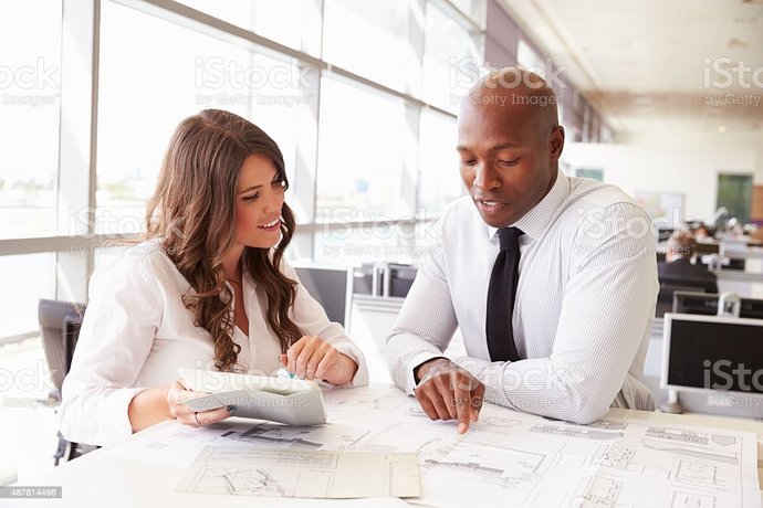Woman and Man working together at the Office