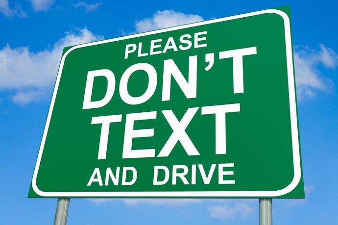The dangers of using a mobile phone while driving.