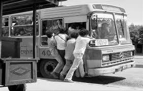 Civilians trying to enter a buss