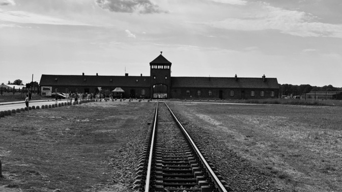From Auschwitz’s Shadow: Silence, Division, and the Perilous Path to Genocide