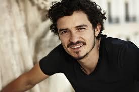 DO you like this guy better with or without the facial hair, and do you find him attractive?