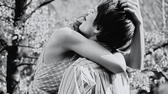 What does it mean when a guy gives you a  really hard hug?