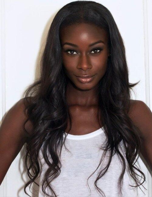 Why are black women considered unattractive by society's standards?