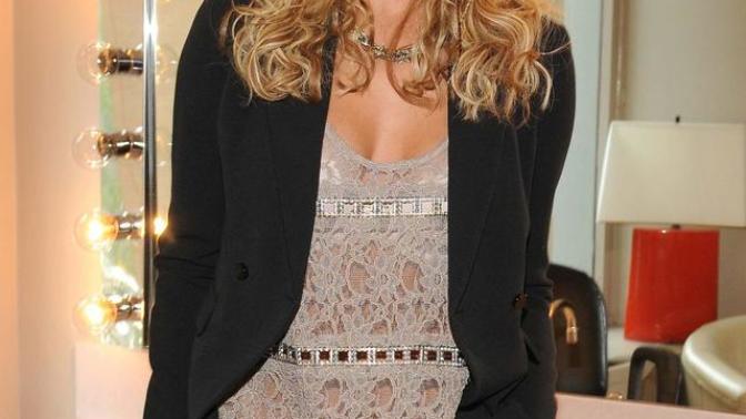Was she better looking as a blonde or as a brunette?