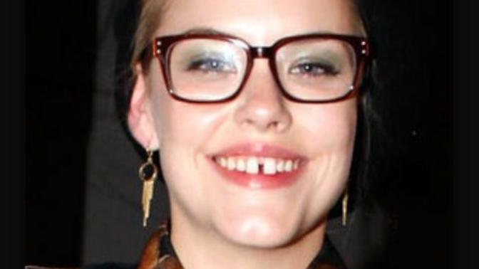 Would you date a girl with a gap in her from teeth? Pictures included?