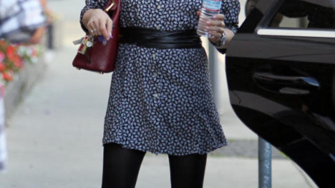 Girls, Why do women wearing black opaque tights with flats look sexier than black opaque tights with heels?