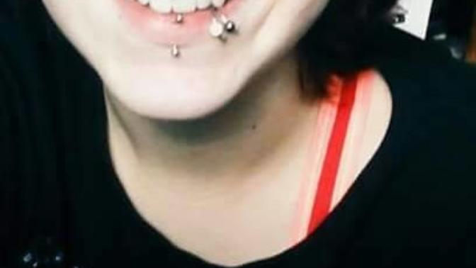 I have 3 lip piercings. Two on the side of my lip and one in the middle.. Is that unattractive?