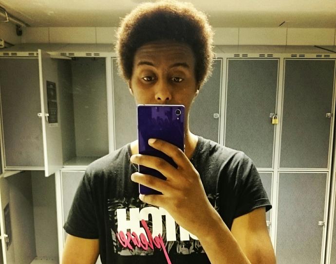 What is my hair color? The first one is when I am under the light?