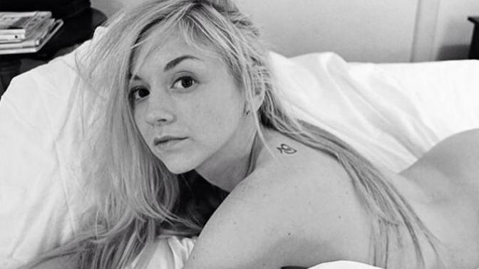 Is this girl topless?