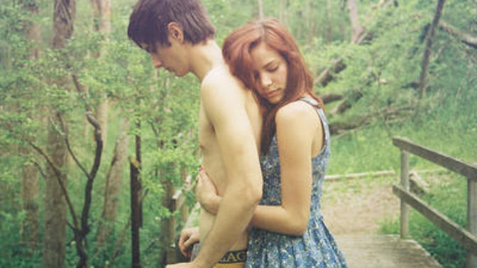 Is that a "sign" if a girl hugs me from behind, touching my chest?
