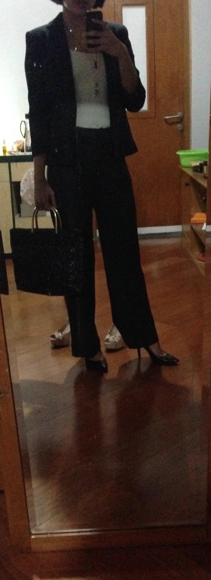 Which outfit is better for a job interview?