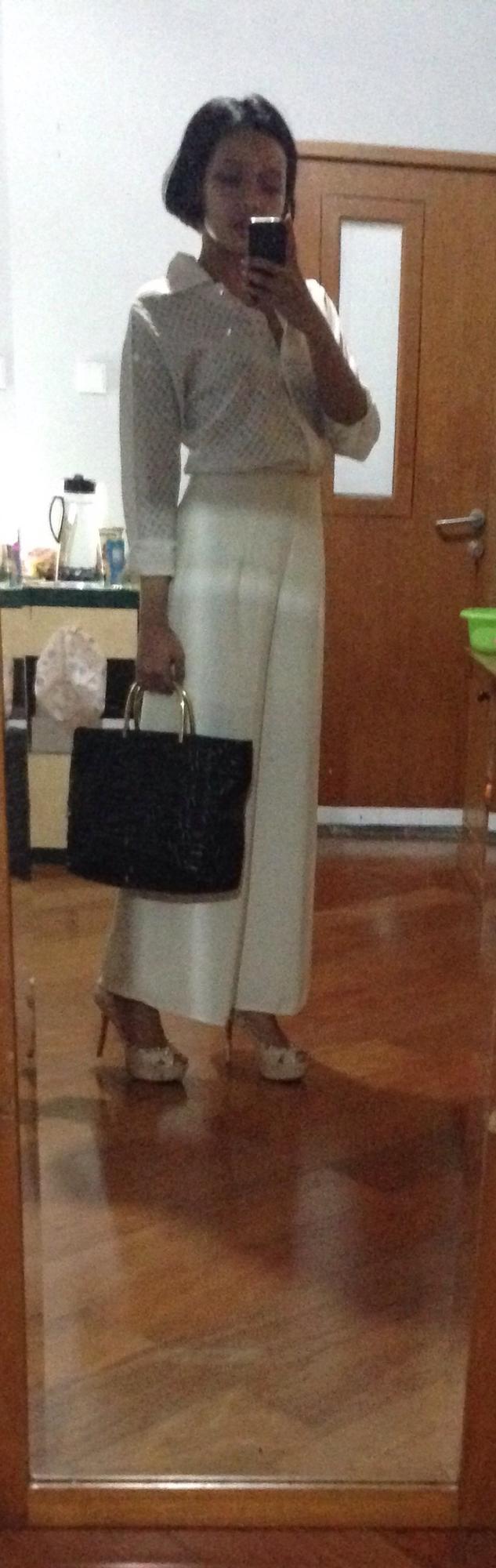 Which outfit is better for a job interview?