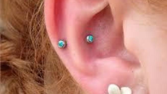 Snug or Rook piercing?