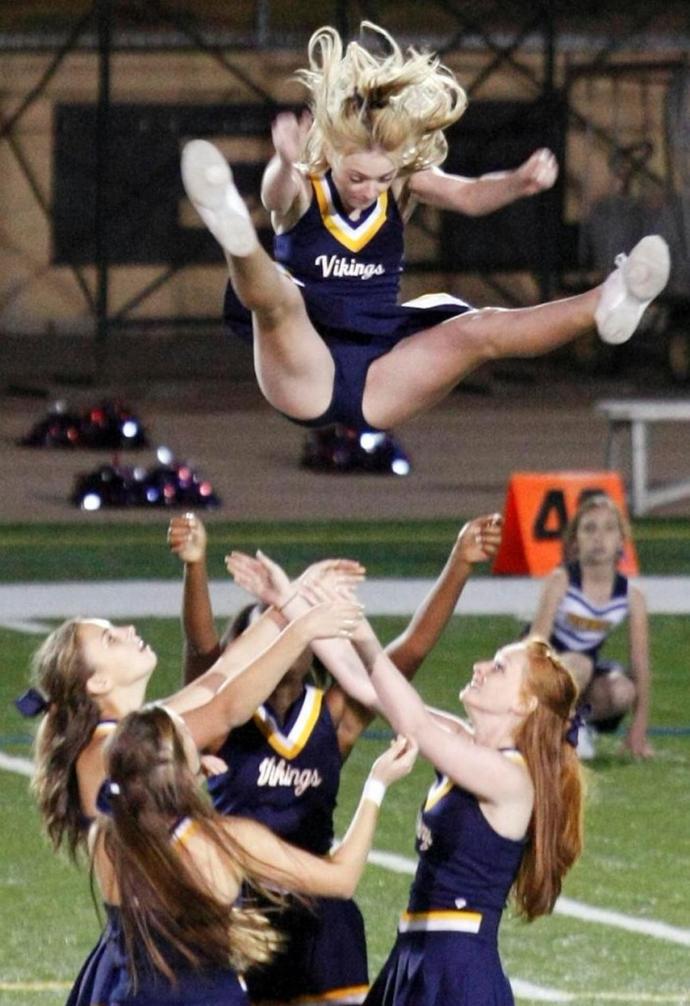 Are CHEERLEADERS a good healthy role model for young girls by showing dedication, confidence, self presentation and Athleticism?