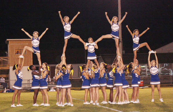 Are CHEERLEADERS a good healthy role model for young girls by showing dedication, confidence, self presentation and Athleticism?