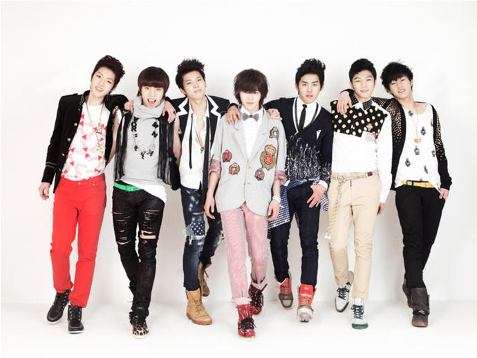 Why do K-pop groups have so many members in them?