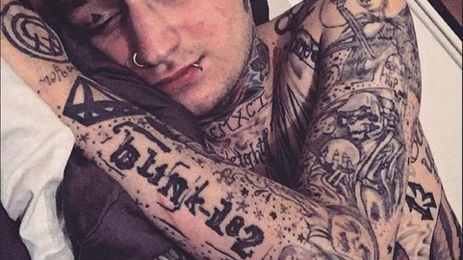 Is it weird that I find heavily tattooed guys attractive?