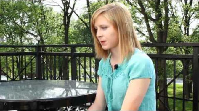 Is this girl attractive? And does she appear to be a girlfriend material?
