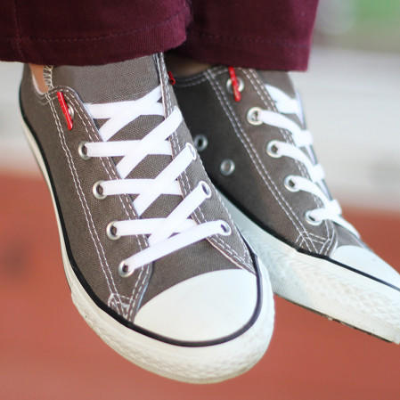 Do you tie, tuck, or strap your shoes?