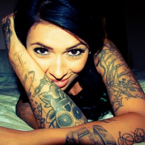 (Pictures) Guy's do you think woman with a lot of tattoos look attractive?