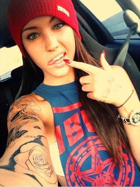 (Pictures) Guy's do you think woman with a lot of tattoos look attractive?