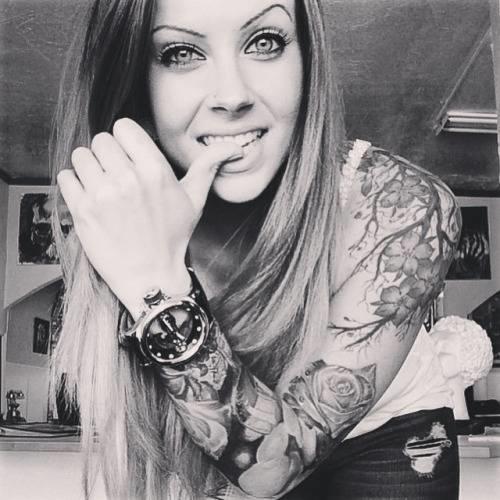 (Pictures) Guy's do you think woman with a lot of tattoos look attractive?