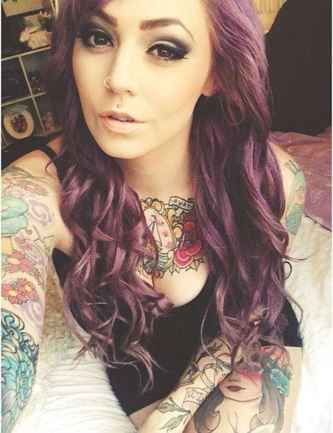 (Pictures) Guy's do you think woman with a lot of tattoos look attractive?
