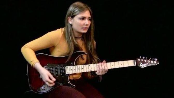 Doesn't that 16 yo girl rock the shit out of that guitar?