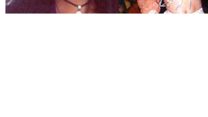 Guys, Blonde or black hair looks better on her?