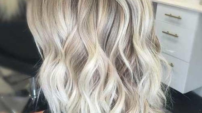 Can you help me out? How will my stylist get my mahogony colored hair that has orange under all of the dye because I tried bleaching it, to this?