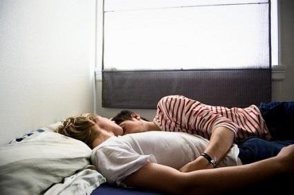 Is it gay if two guys sleep in the same bed together?