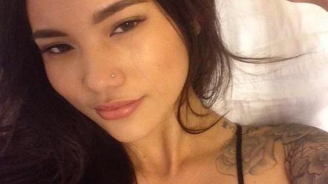 What race does she look? And do you think she's pretty?