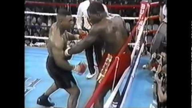 Would you rather take a powerful uppercut to the testicles/vagina/crotch/groin from Mike Tyson or a powerful kick to the groin by a?