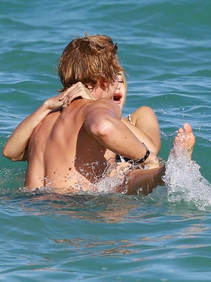 Would you be hesitant to post YOUR VACATION pictures if it looked like you could be CHEATING ON YOUR SO?