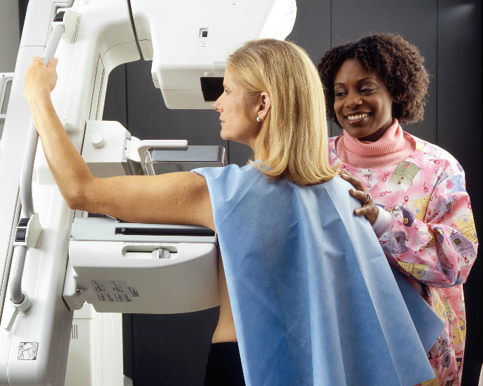 Girls, When you get/got your first mammogram, would you want to wear a gown or would you be comfortable being topless?